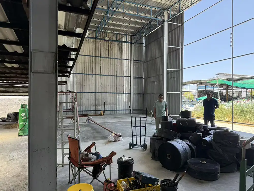 Empty bay at J.H. Industries ready for three-layer co-extrusion film blowing machine
