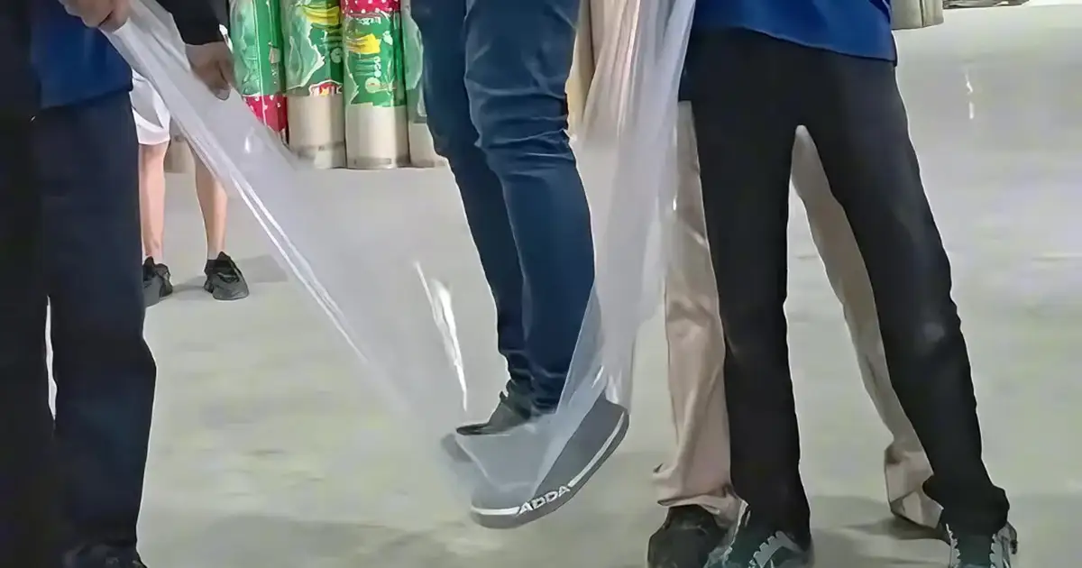 actory worker standing on ABA blown film without tearing